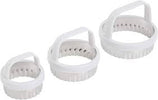 Three round scalloped biscuit cutters in graduated sizes with white handles on a white background