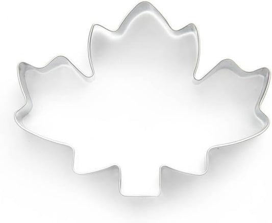 Stainless steel maple leaf cookie cutter on a white background.