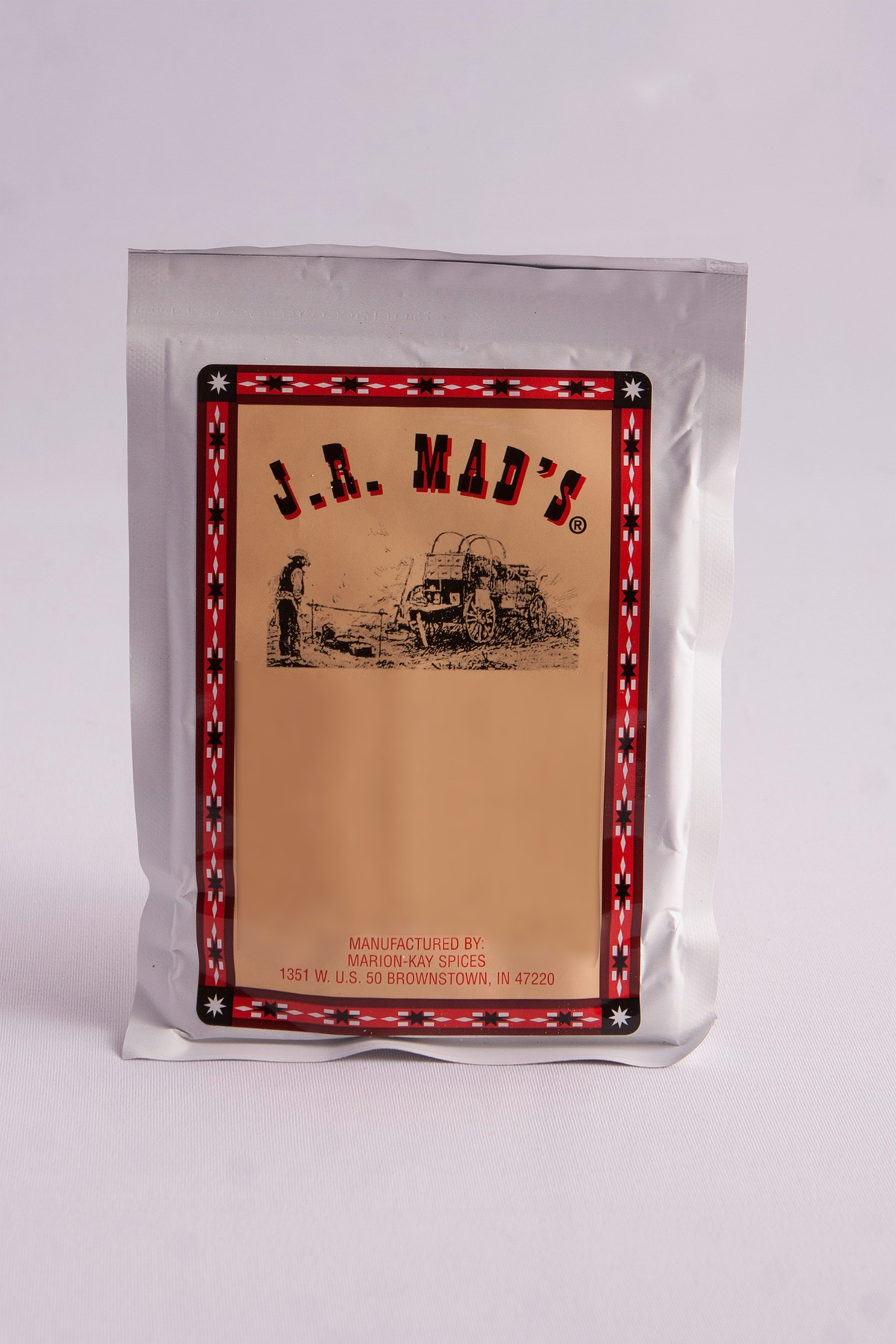 Packet of J.R. Mad's Pork & Beans Fixin's seasoning on a white background