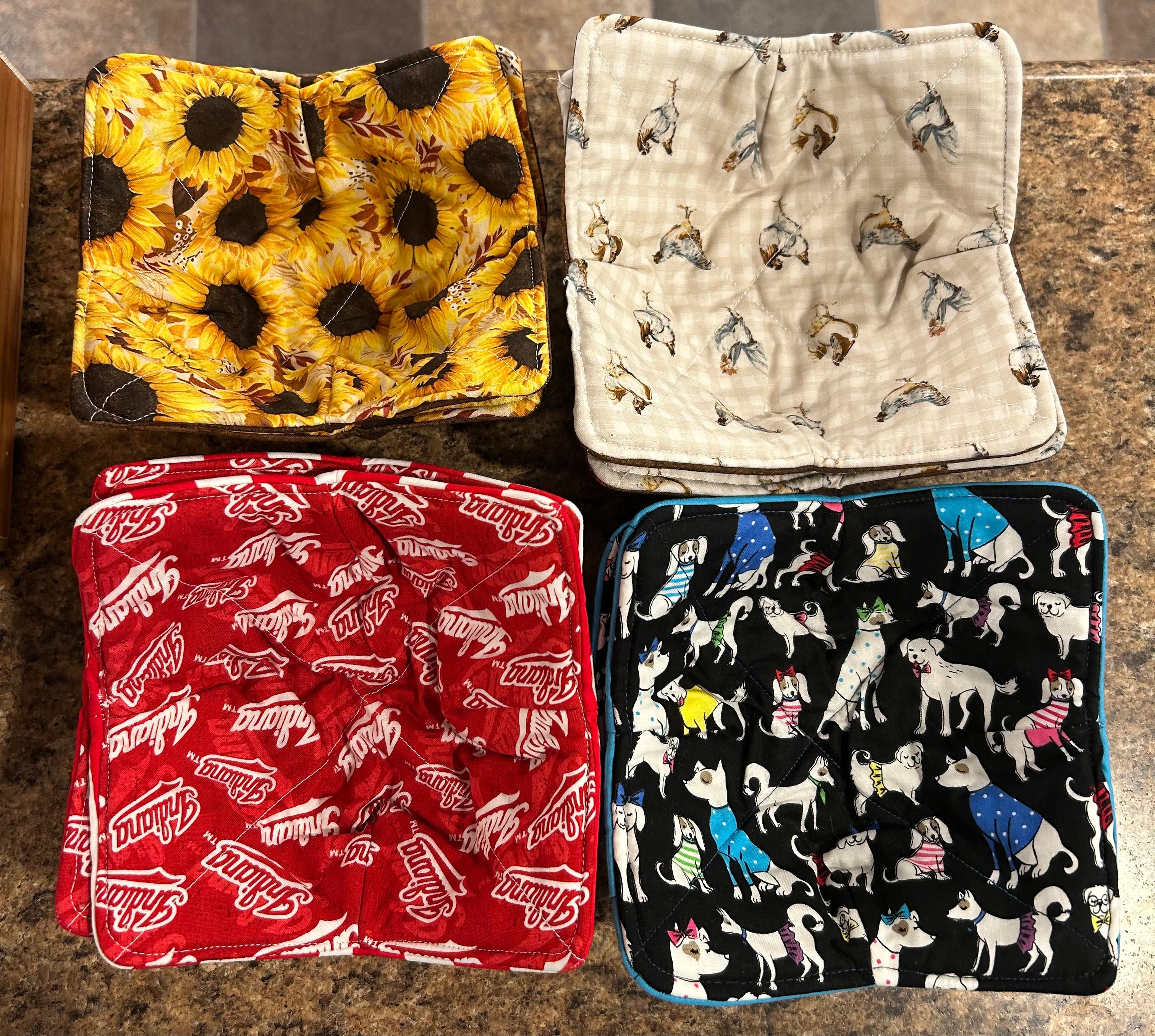 Handmade cloth bowl cozies in colorful assorted fabric prints for carrying a warm bowl