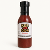 Jar of Kiss the Cook Red Raspberry Vinaigrette on a white background