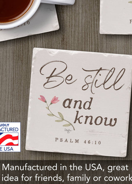 Inspirational stone coaster on tabletop