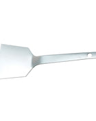 Small stainless cookie spatula for lifting cookies and brownies.
